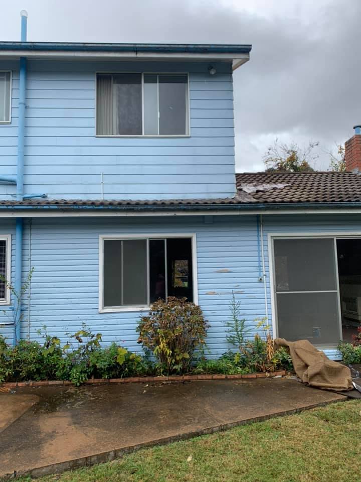sky blue painted house, painting services near me