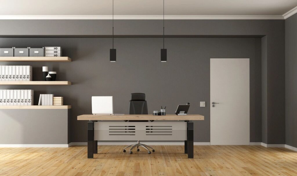 Office design with a desk and dark grey painted wallsOffice design with a desk and dark grey painted walls